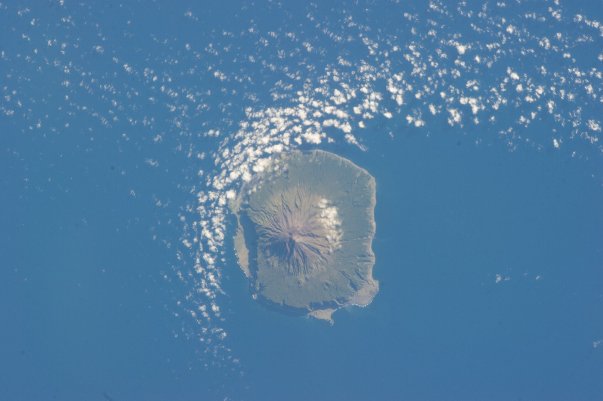 Tristan da Cunha from the International Space Station, trailing a wake of cloud